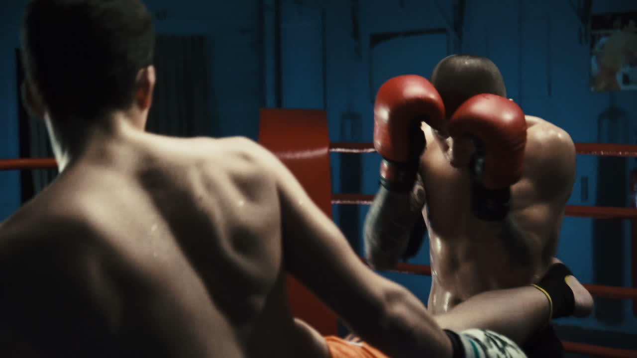Two Men Boxing in the Ring