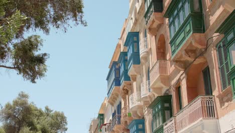 typical maltese bow windows of buildings in valletta, malta