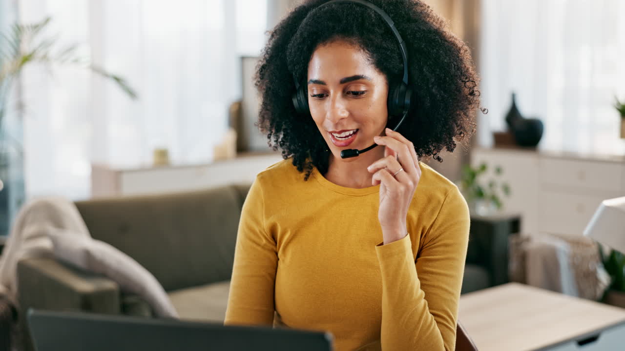 Woman with headset working from home