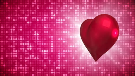corazón giratorio con un fondo de discoteca