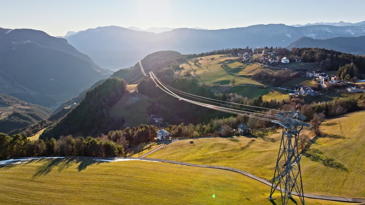 Aerial drone view of the Soprabolzano village on the Renon plateau in the Dolomites, Italy