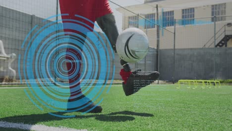 animation of scope scanning over football player with prosthetic limb kicking ball