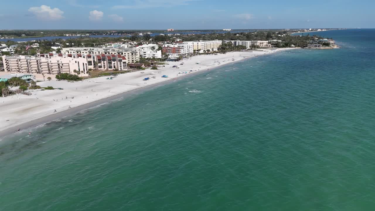 calm coastal panorama of southern Siesta Key beach from the gulf looking toward the island