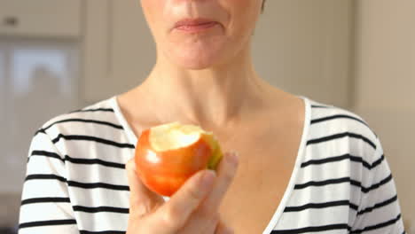 woman eating an apple