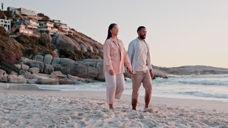 Walking,-holding-hands-and-sunset-with-couple