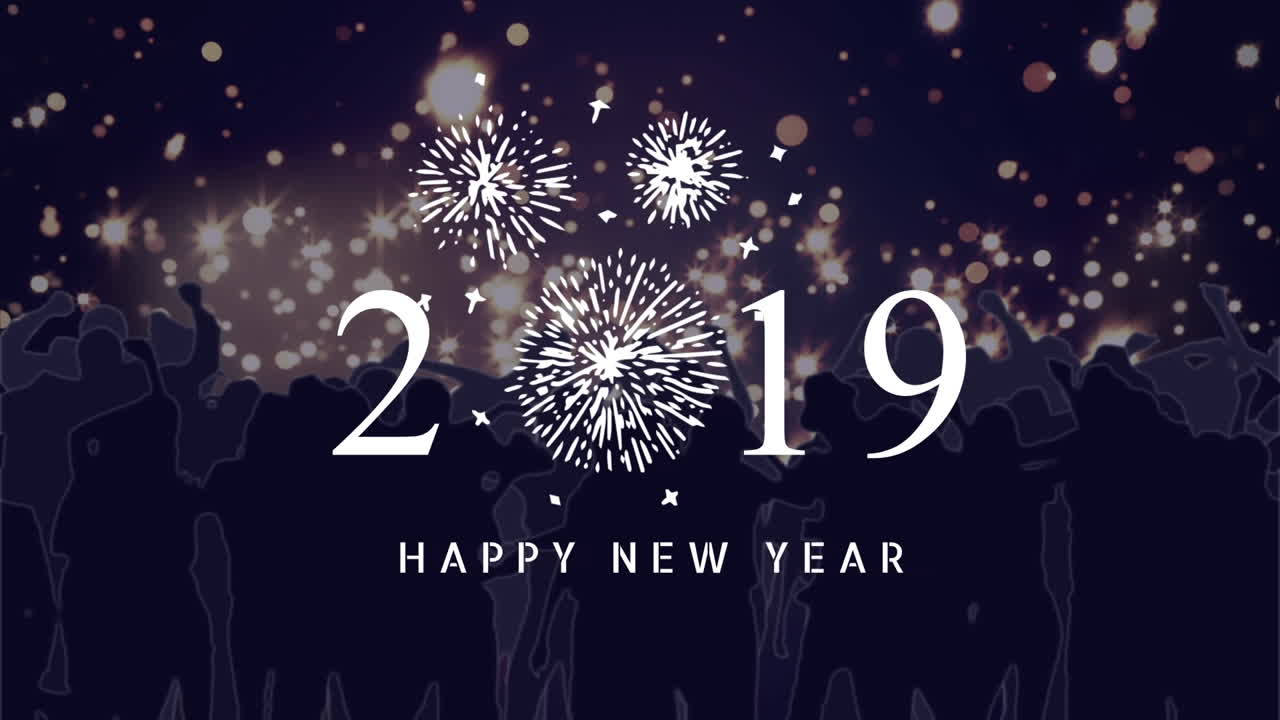 Silhouette of people dancing against 2019 New Year Sign 4k