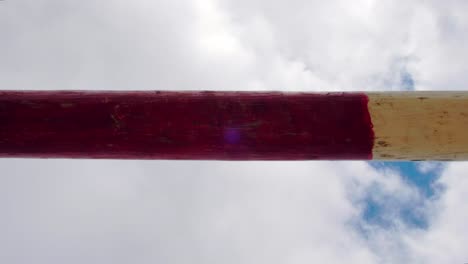 horse jumping over hurdle pole