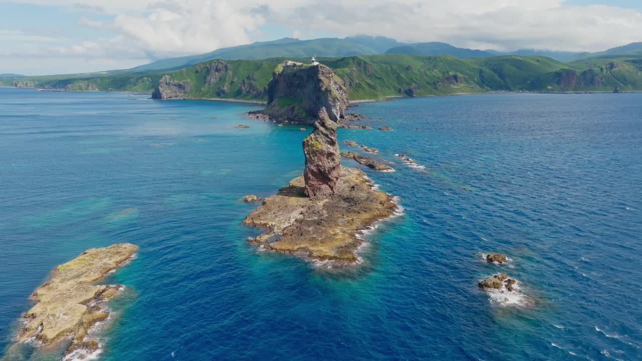 aerial establishing fly stone beach landscape in shakotan hokkaido japan, drone natural environment, famous secret cliff