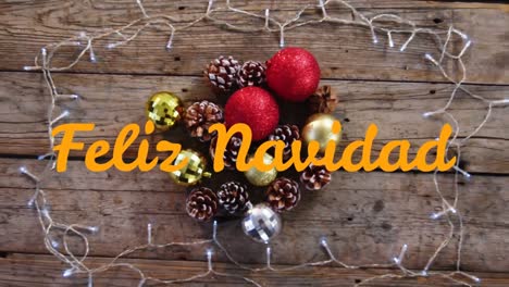 Feliz-Navidad-über-Weihnachtsdekorationen-Geschrieben