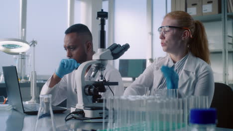 scientists working in a laboratory setting.