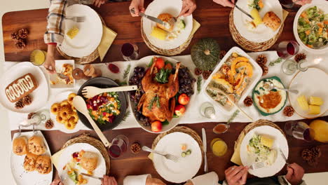 family enjoying thanksgiving dinner together