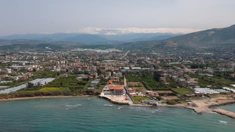 coming into shot of beautiful koura city waterfront from sky, lebanon