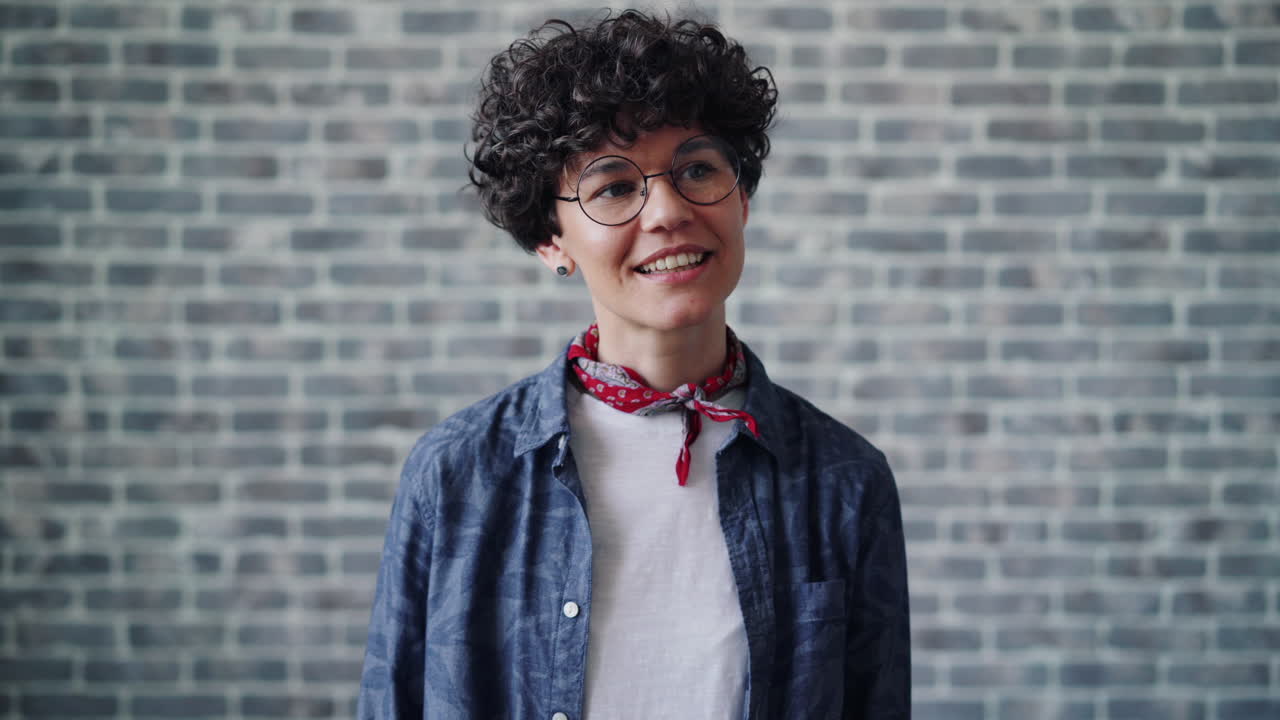 Woman with Curly Hair and Glasses