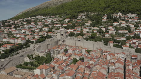 Fly over Old Town Dubrovnik towards lookout tower.