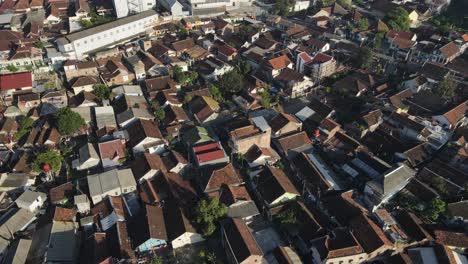 An-aerial-view-of-downtown-Yogyakarta,-cities,-buildings,-houses-and-small-streets-was-shot-in-the-morning