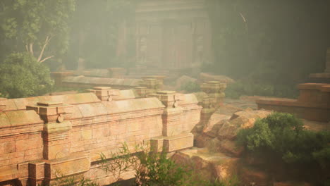 Ancient temple hidden in the lush jungle of thailand surrounded by mist