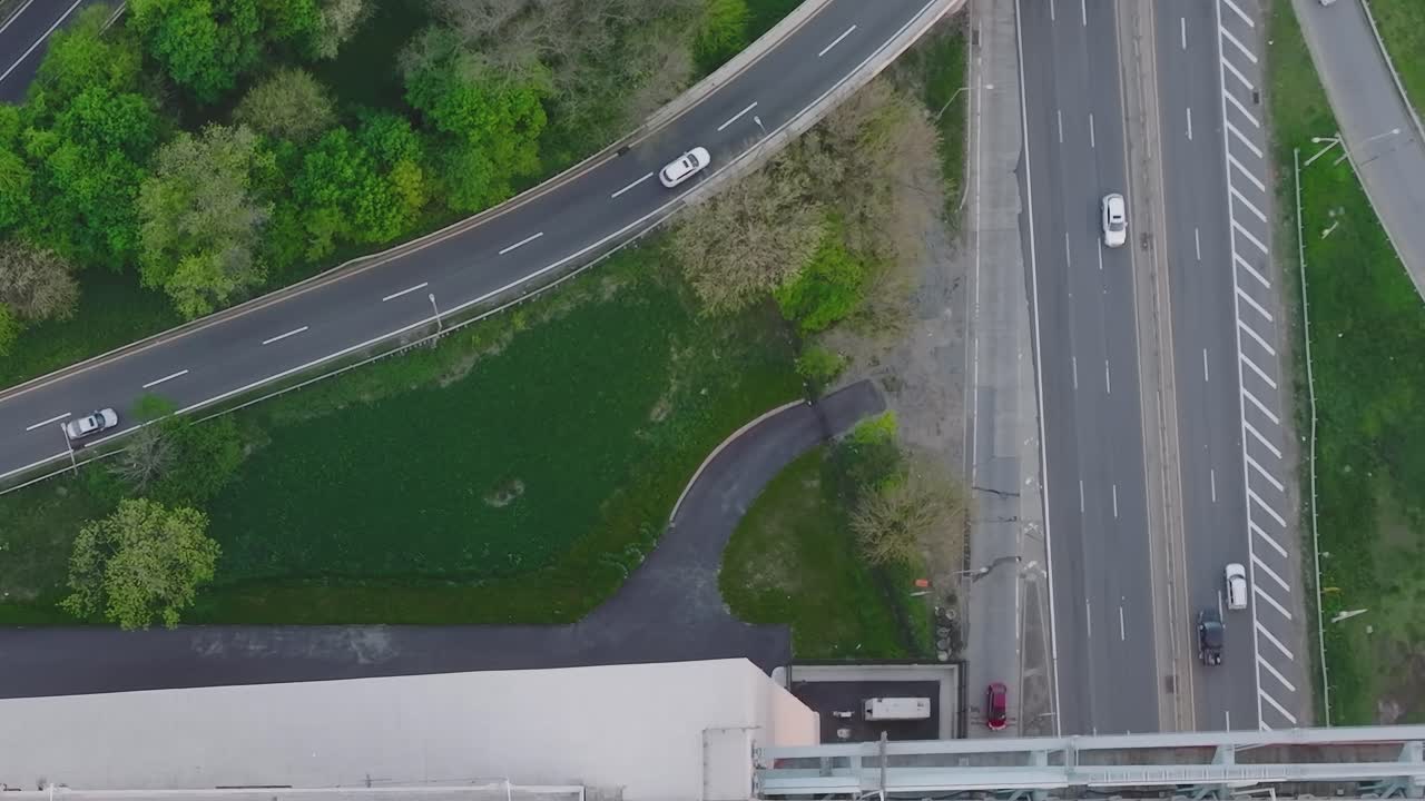 Aerial View of Highway with Cars and Green Space