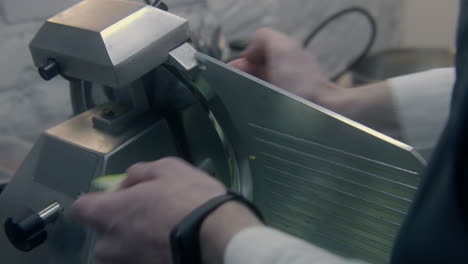 using a meat slicer