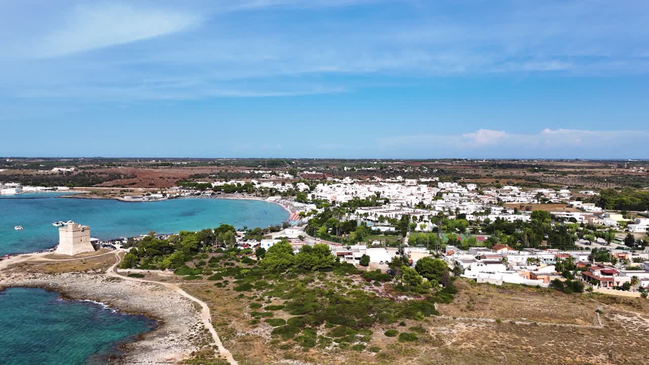 Tropical coastline with blue lagoon in Italy, aerial view