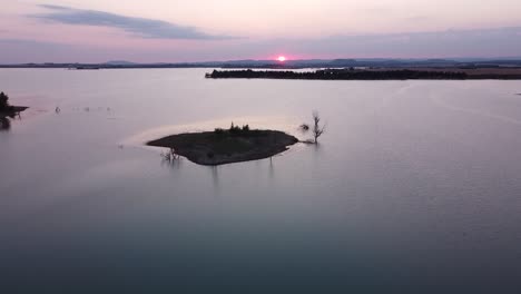 Sotonera-Dam-Lake-in-Huesca,-Spain---Aerial-Drone-View-during-sunset