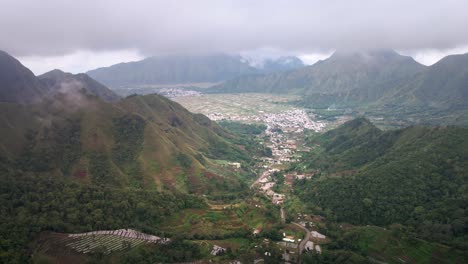 aerial 4k view at sembalun village valley near volcano rijani national park, lombok, indonesia