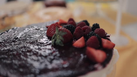 decadent chocolate cake topped with fresh berries