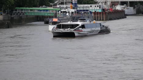 tourist sighseeing cruise boat in river thames