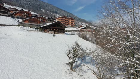 Jib-up-of-beautiful-chalets-in-a-snow-covered-Swiss-town