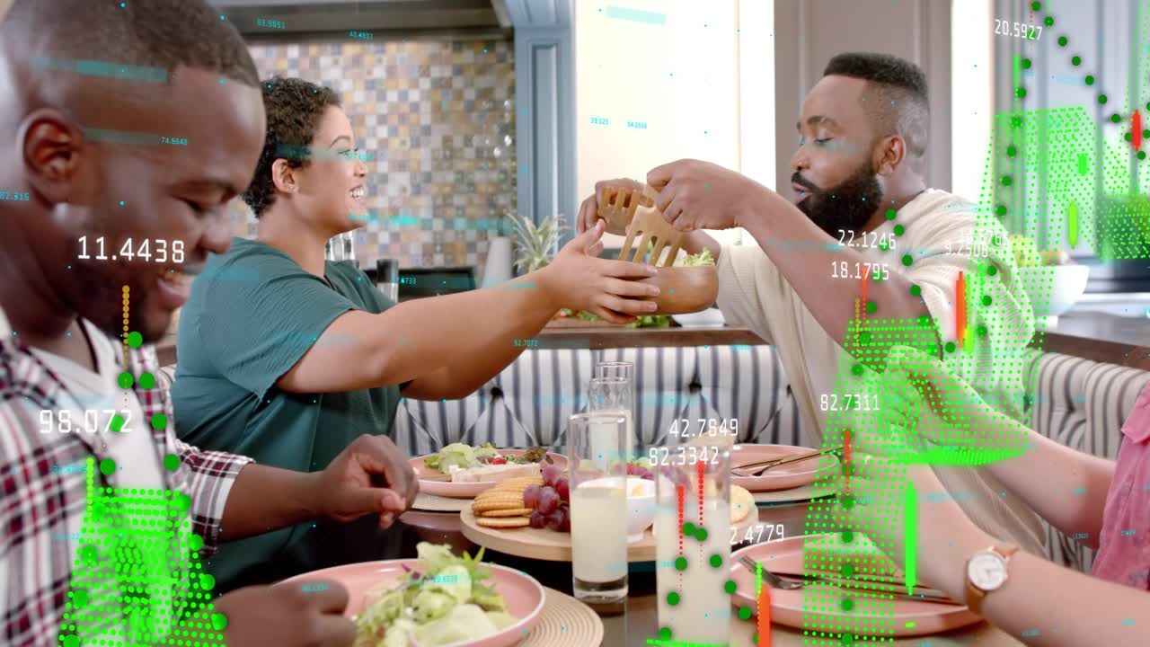 Friends exchanging smiles spurring salad bowl passing for dining, data overlay growing over plates