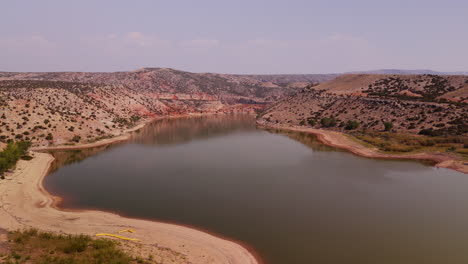 aerial view of a mountainous lake in a canyon