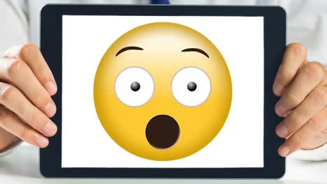 tableta que muestra un video sonriente animado con conmoción