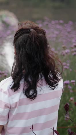 woman in a field of flowers
