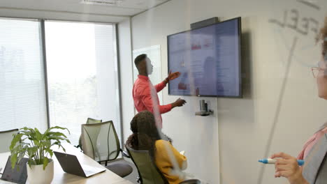 casual diverse businesspeople in meeting room in office, slow motion with copy space
