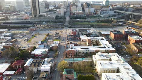 shockoe bottom, main street station, and downtown richmond, virginia | aerial view panning up | winter 2022