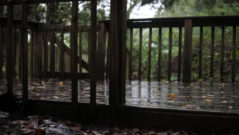 a wet wood patio porch on a rainy day