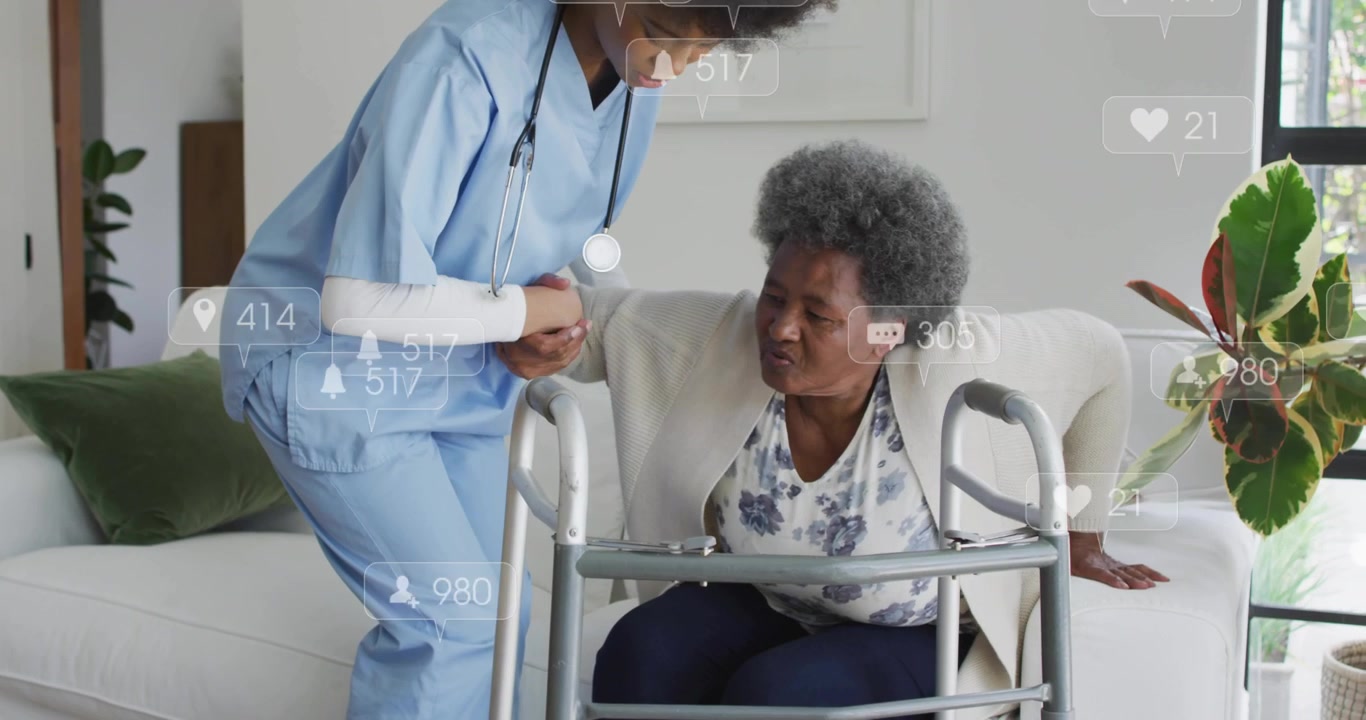 Nurse initiating home health and kneeling by patient, adjusting walker and guiding patient rising