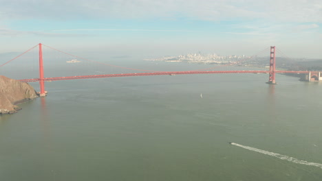 aerial shot over the golden gate bridge towards san francisco