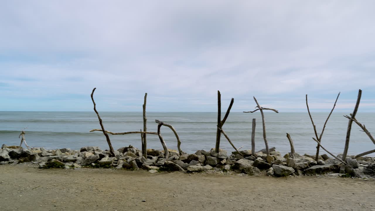 The famous beach sculpture made from found driftwood on Hokitika Beach, New Zealand.