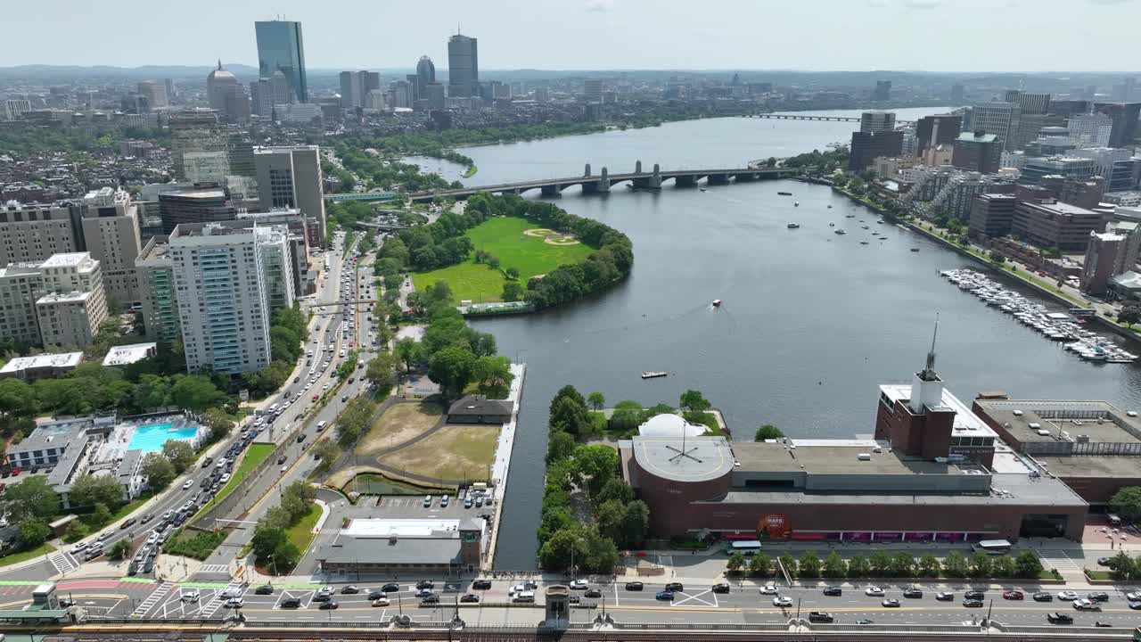 Drone shot of Boston's Museum of Science and Lederman Park both sitting on the Charles River