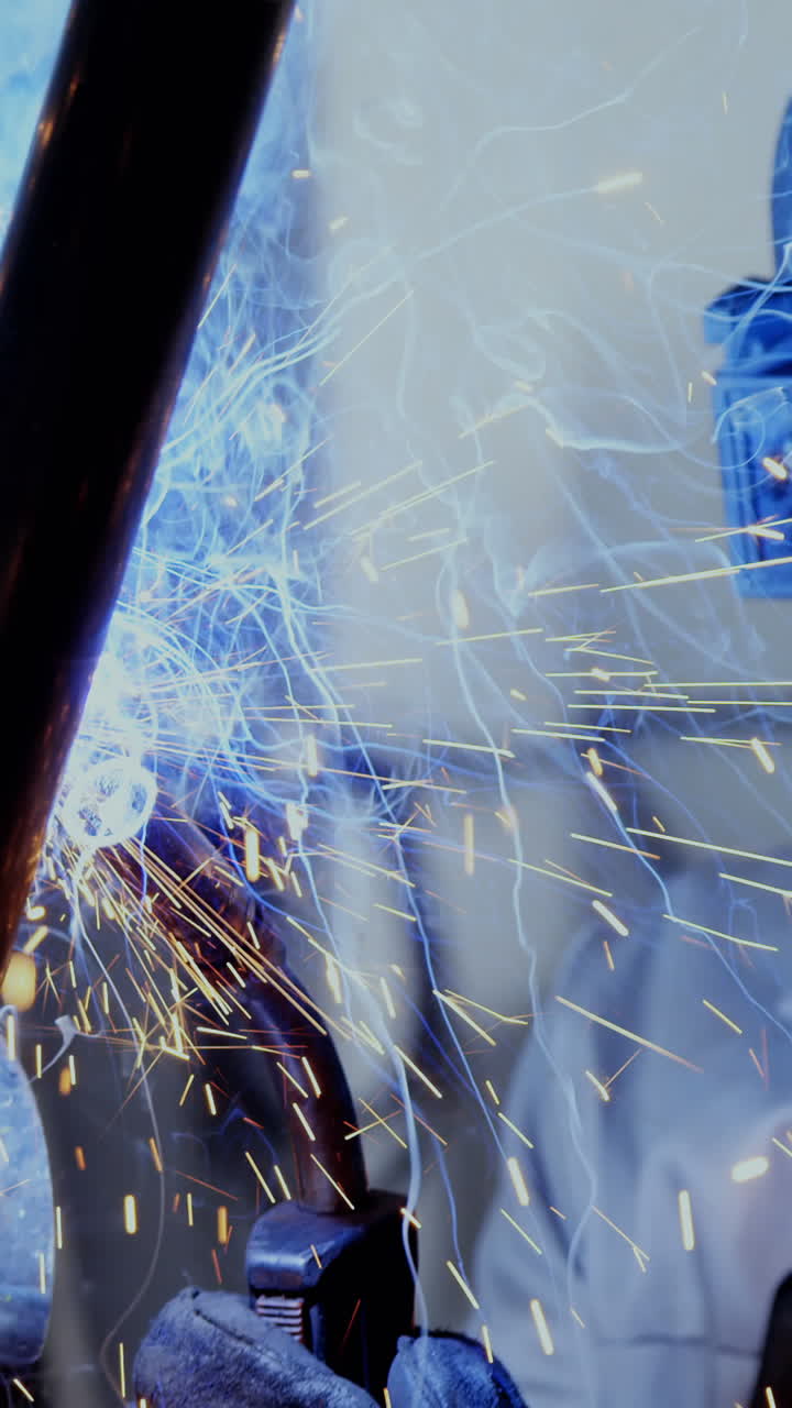 Welder welding a metal