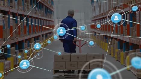 Network-of-digital-icons-against-rear-view-of-senior-male-worker-pulling-a-pallet-at-warehouse