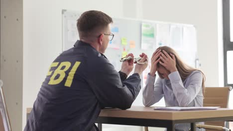 FBI Agent Interrogates Woman