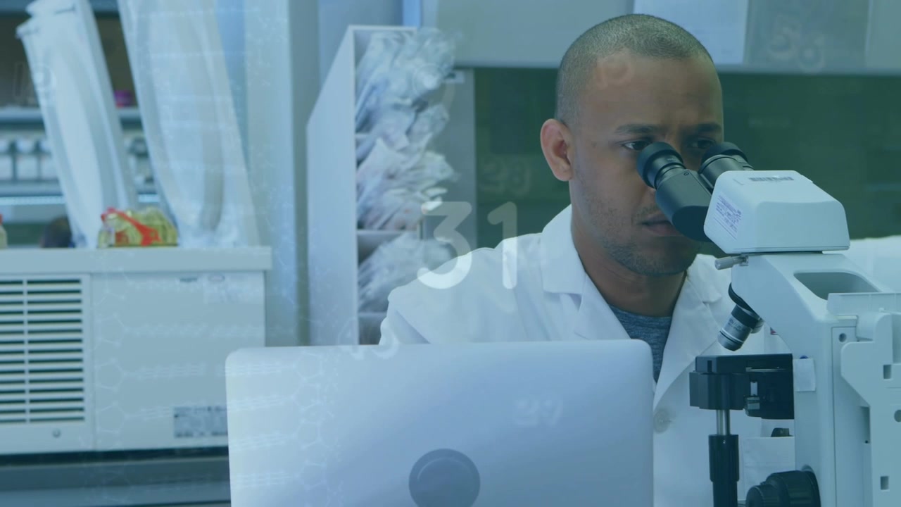 Animation of scientific data and counting over african american male lab worker using microscope