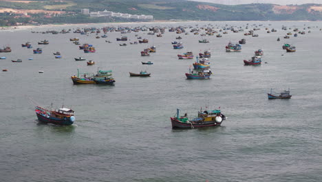 aerial view of fishing boats in the ocean - overfishing and climate damage in vietnam