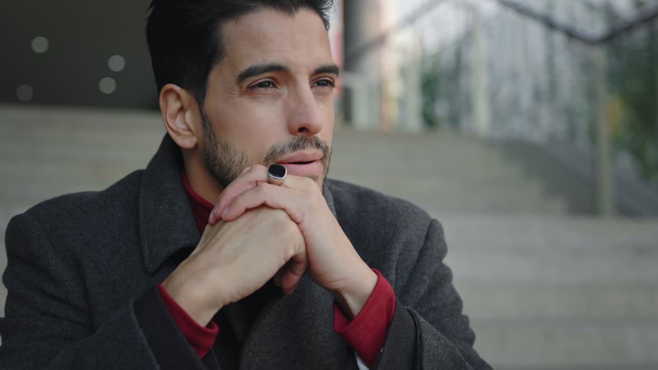 A thoughtful man outdoors