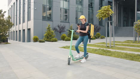 woman on electric scooter making delivery