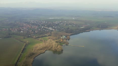 Drone-Aerial-of-the-Lake-Seeburg-Seeburger-See-on-a-beautiful-sunday-morning-in-the-Harz-national-Park-near-Göttingen-in-central-germany