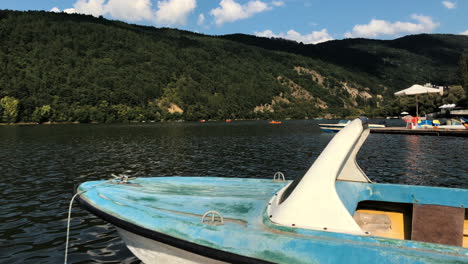 clip of a boat berthed in the pancharevo lake, bulgaria