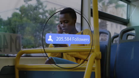 animation of followers growing number over african american woman using smartphone in bus