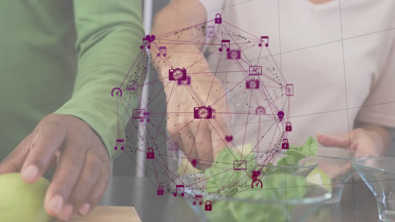 Man placing apple, slicing it and woman picking spinach making healthy salad with digital overlay